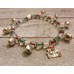 RTD-4012 : Silver Bells Bracelet w/ Festive Christmas Colors and Jingle Bell Charm at Heavens Charms